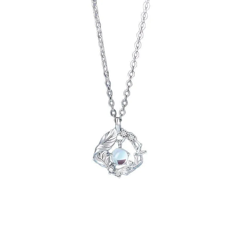 Tree and bird pendant necklace with adjustable chain and alloy construction