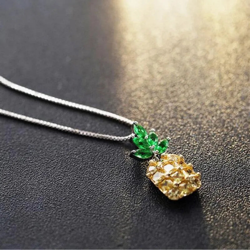 Silver Korean fashion necklace with a geometric pineapple and diamond design pendant.