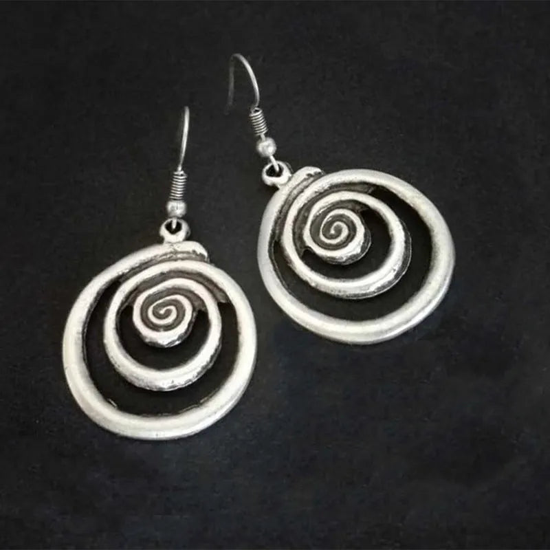 Retro geometric spiral earrings with distressed silver finish measuring 2.6cm by 5cm