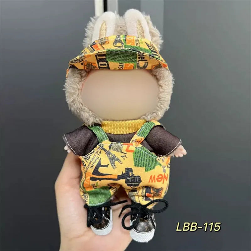 Plastic doll clothes for a 17cm tall vinyl figure on a white background.