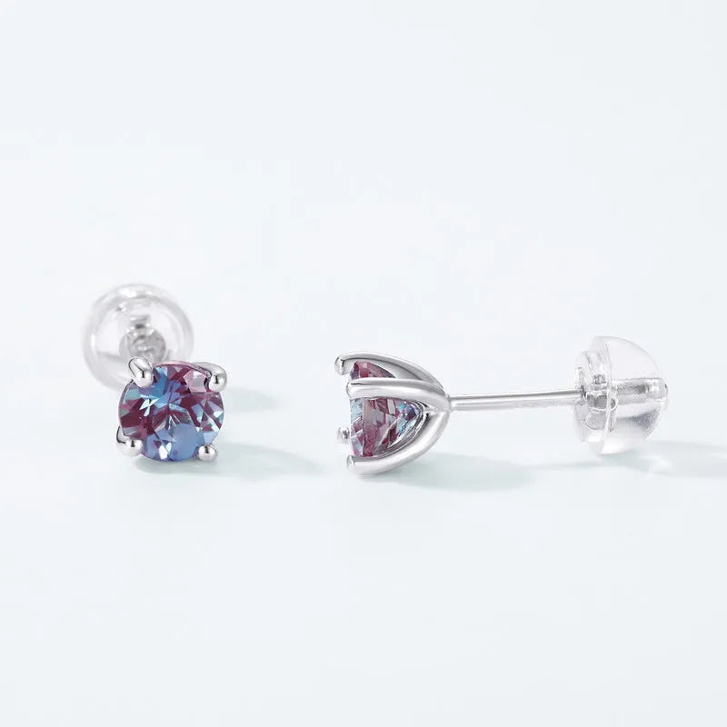Simple geometric Alexander Stone ear studs in 925 silver with round design.