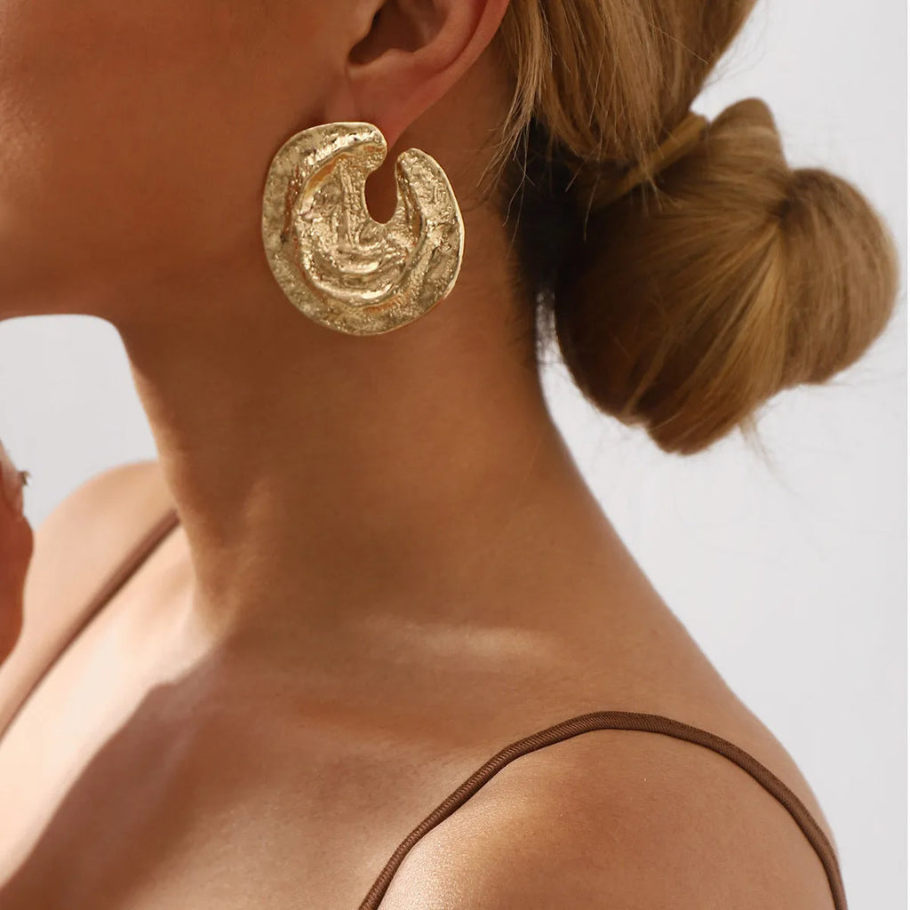 Exaggerated geometric women's earrings with irregular pleats and textured concave-convex surface