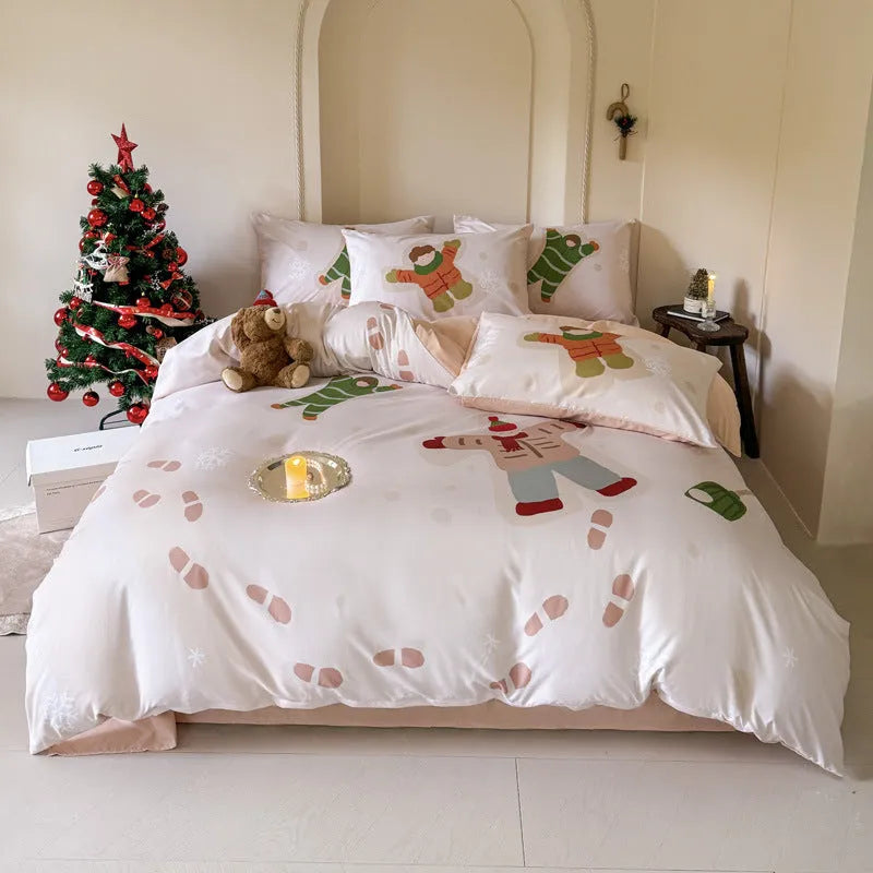 Christmas cartoon printed duvet cover and pillowcases on a bed, showing Gingerbread Man pattern.