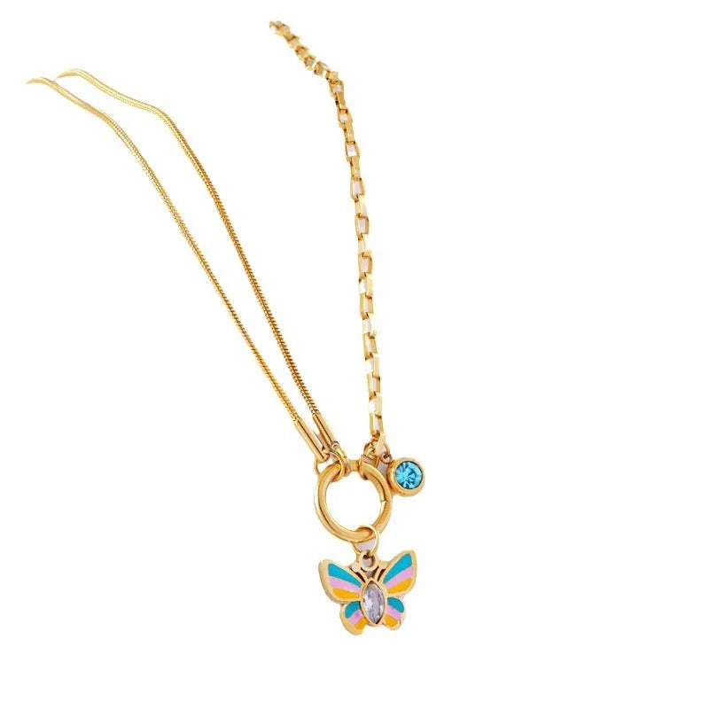 Gold tone epoxy butterfly pendant necklace and bracelet set with snake bone chain.