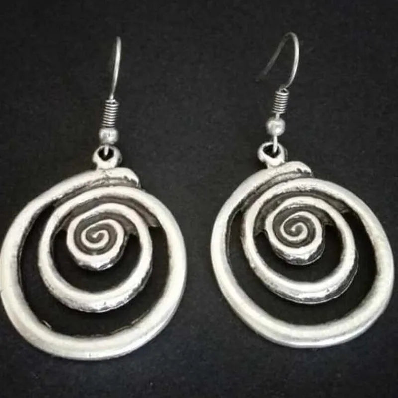 Retro geometric spiral earrings with distressed silver finish measuring 2.6cm by 5cm