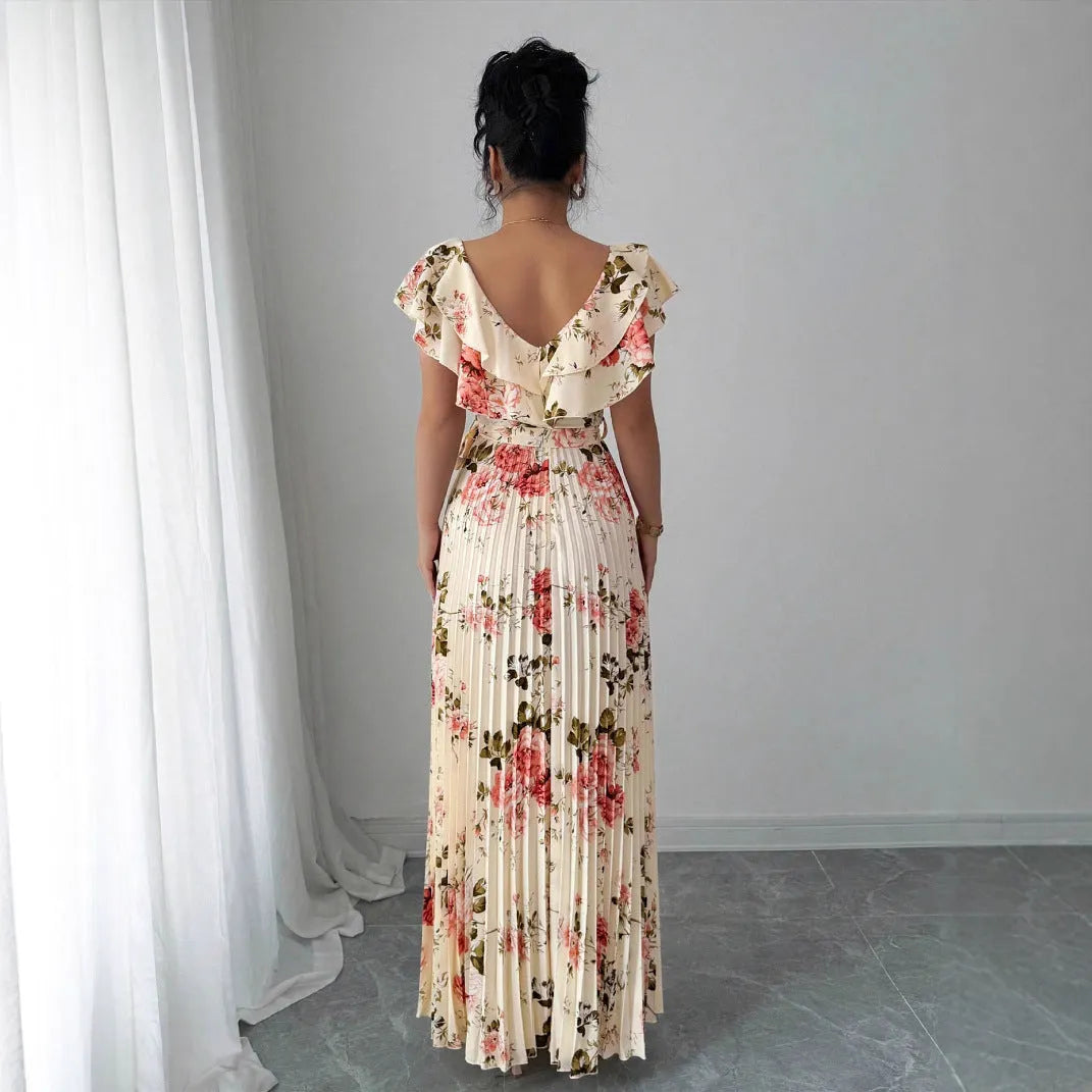 Apricot coloured V-neck floral print dress with ruffled sleeves and an oversized swing skirt