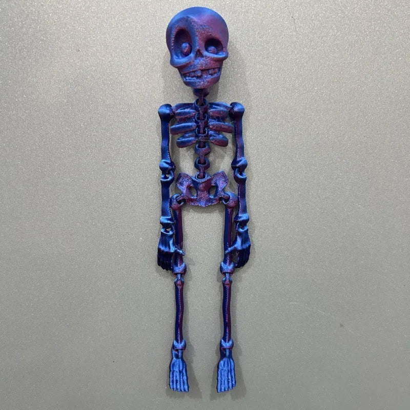 A tall 3D printed white skull refrigerator magnet for Halloween decoration.