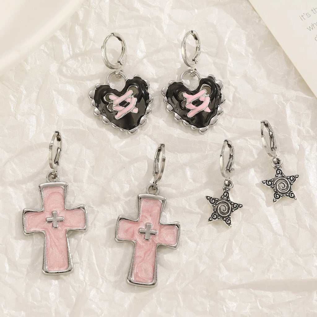 Women's alloy drop earrings showing cross, heart, and animal designs in five colour finishes