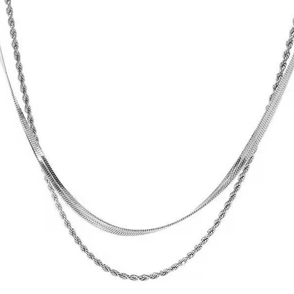 Gold geometric double-layer twist necklace on adjustable snake chain, shown at 40cm length.