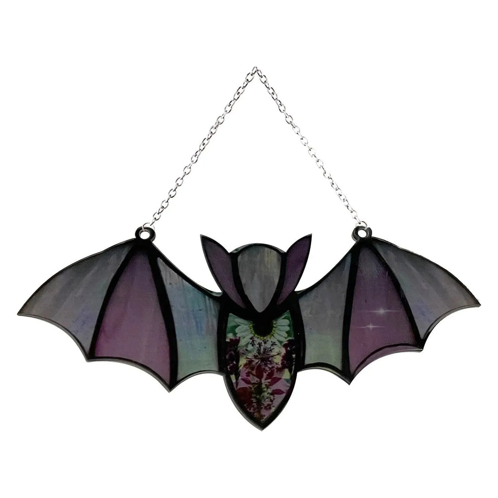 A modern art style bat printed on a clear acrylic wall hanging pendant.