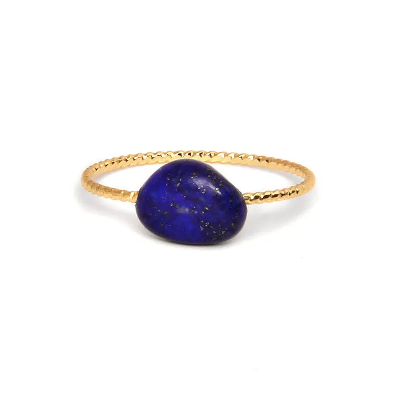 Women's geometric niche design ring with a coloured agate stone centrepiece.