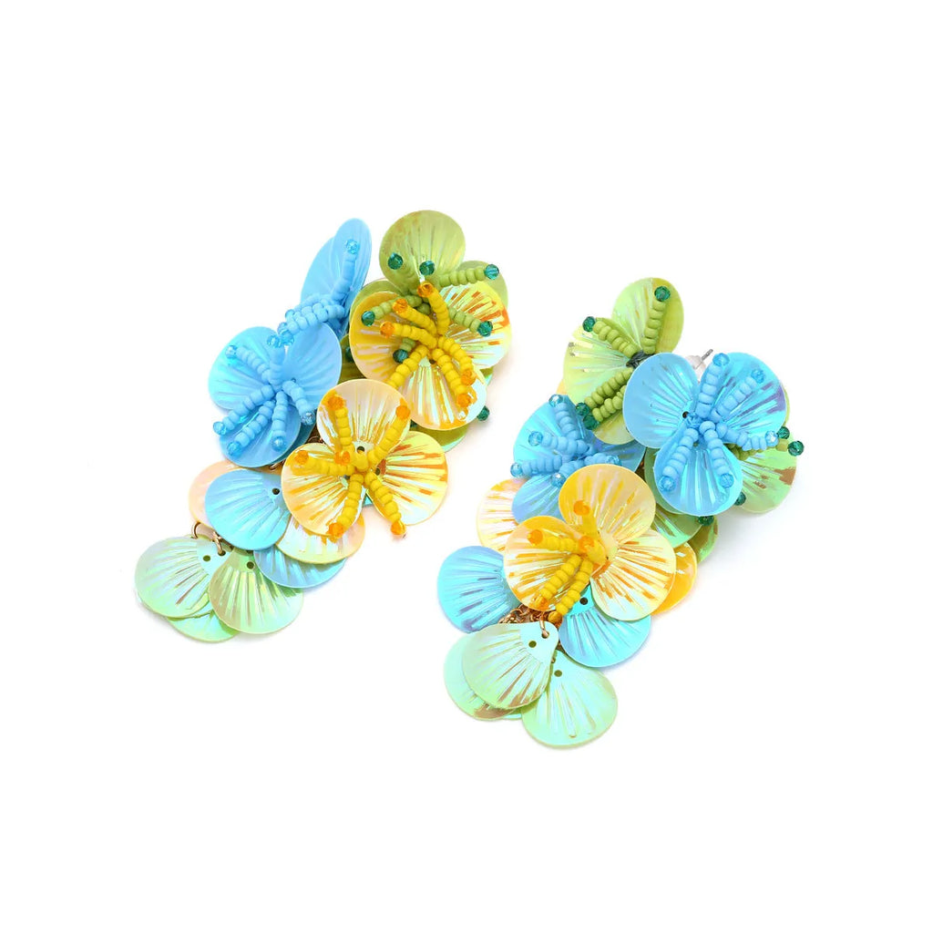 Handmade string bead flower earrings in colourful, purple and rose options with exaggerated dopamine design