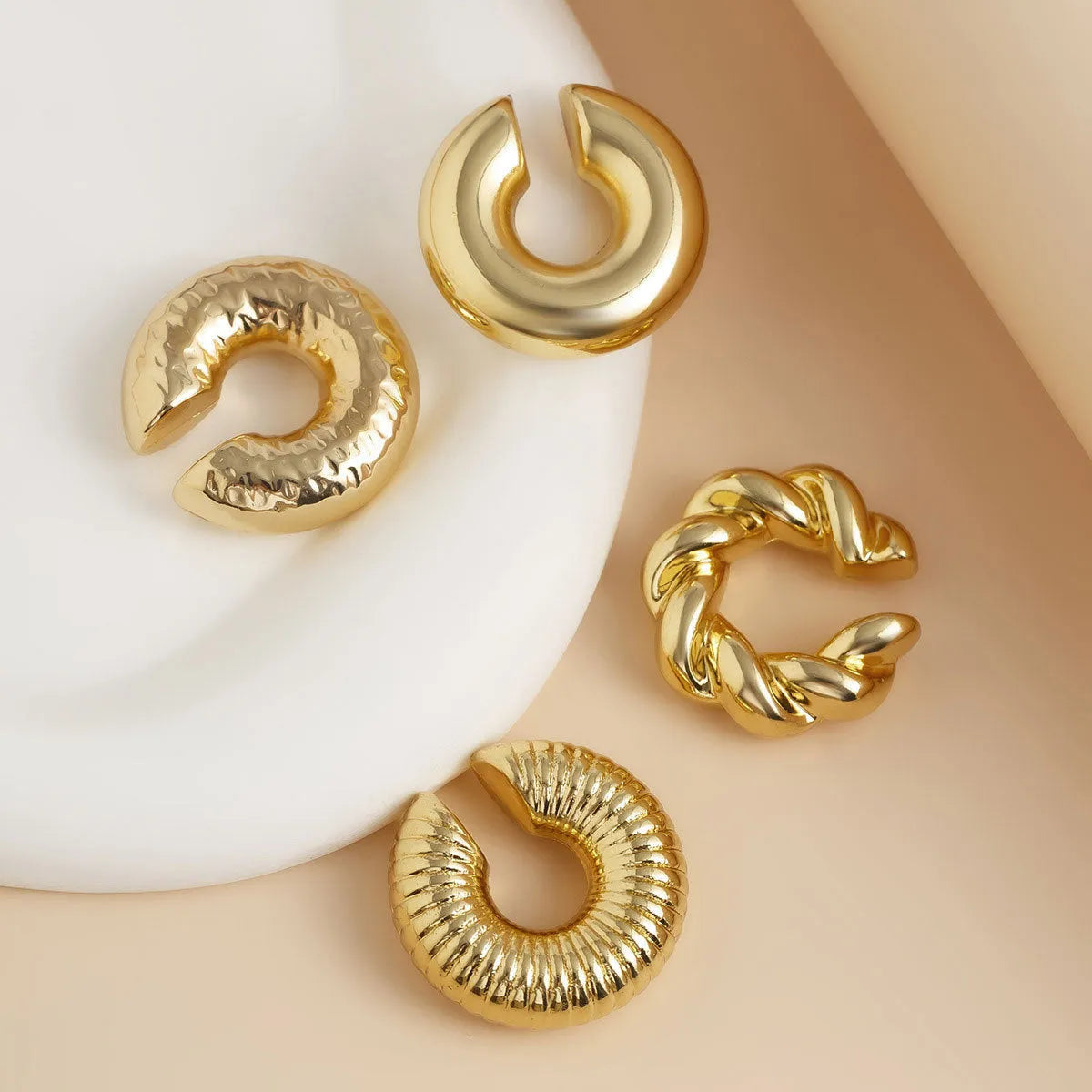 Geometric gold and silver ear clip set for women without pierced ears requirement