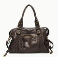 Women's retro motorcycle shoulder messenger bag in brown with weaving design elements and single adjustable strap