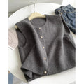 Women's thin grey polyester pullover vest with half sleeves, shown as a casual layering piece.