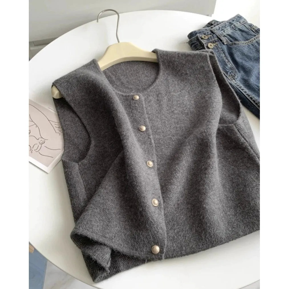 Women's thin grey polyester pullover vest with half sleeves, shown as a casual layering piece.