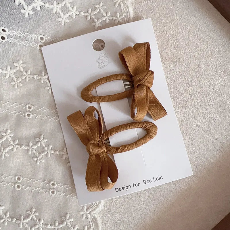 Children's cloth bow barrettes in deciduous colours red pink beige milk tea yellowish brown brown alloy clips