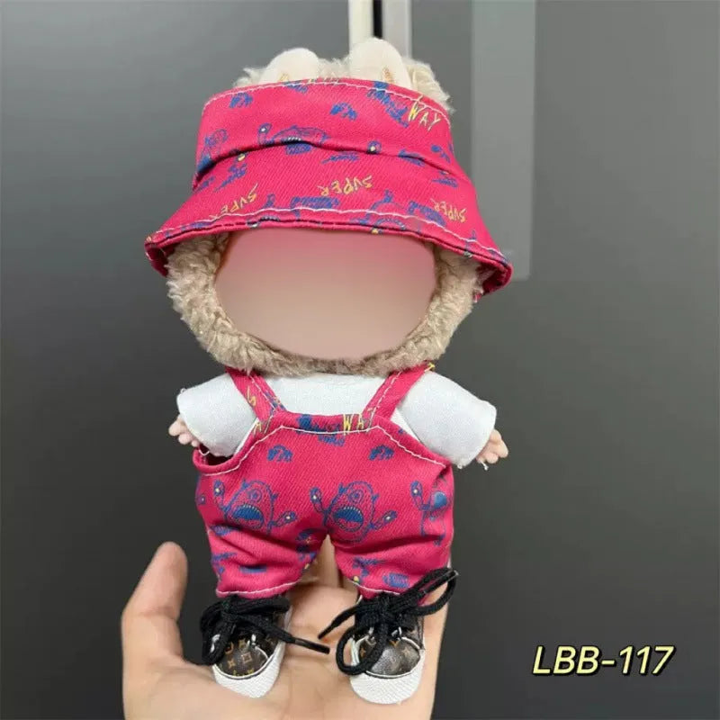 Plastic doll clothes for a 17cm tall vinyl figure on a white background.