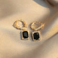 Geometric black zirconia and copper earrings with a quadrilateral shape, E2506 Black colour.