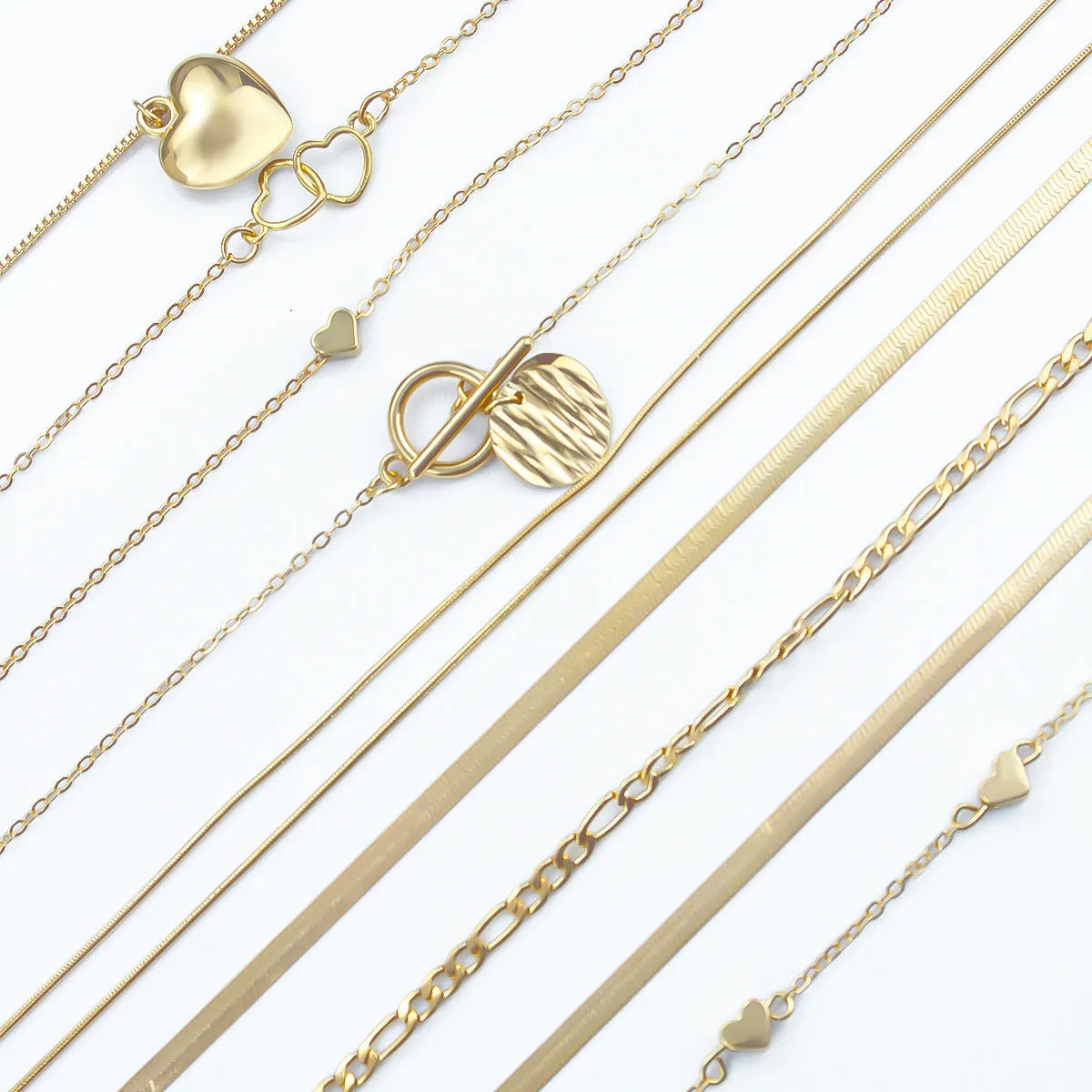 Ten gold electroplated women's necklaces with alloy pendants on snake bones chains