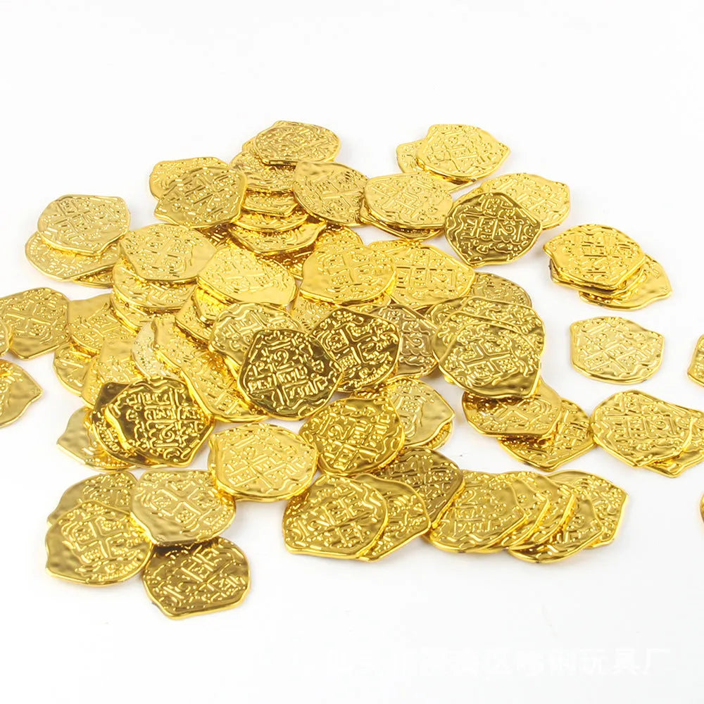 A pile of metallic gold plastic Roman pirate coins from a 100-piece pack for treasure games.