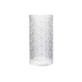 Begonia patterned glass drinking cup in short and tall sizes on a table.
