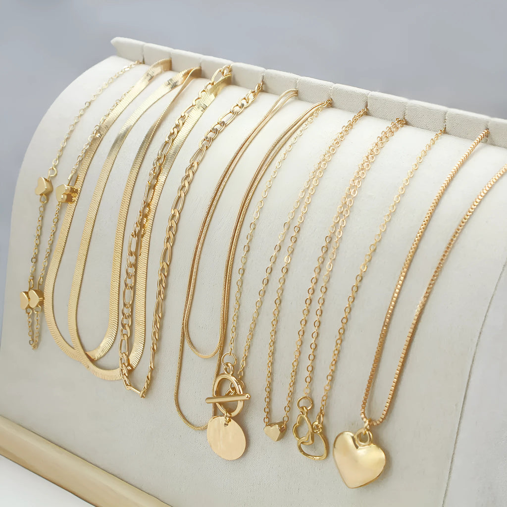 Ten gold electroplated women's necklaces with alloy pendants on snake bones chains