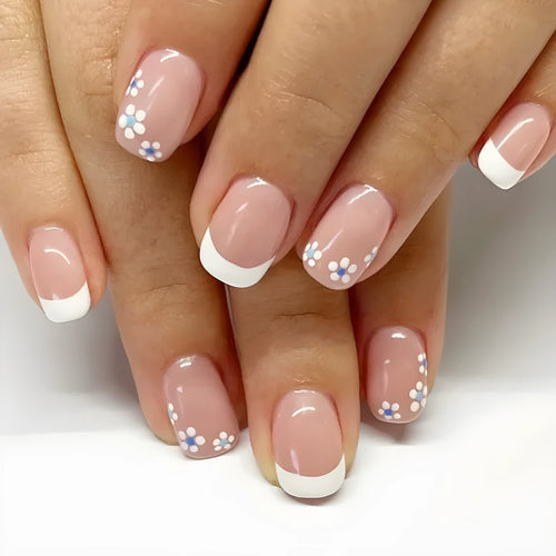24 pieces of short wearable nail patches with white French flower pattern on plastic backing, with jelly glue wipe