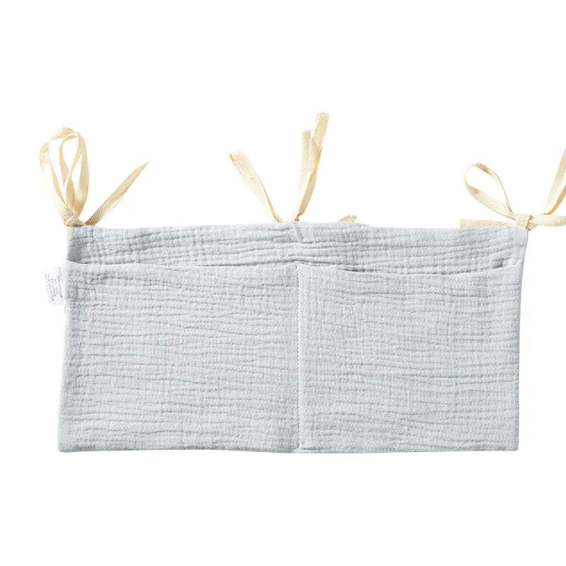 Cotton double layer baby bedside buggy bag in colour option, attached to a cot for storage