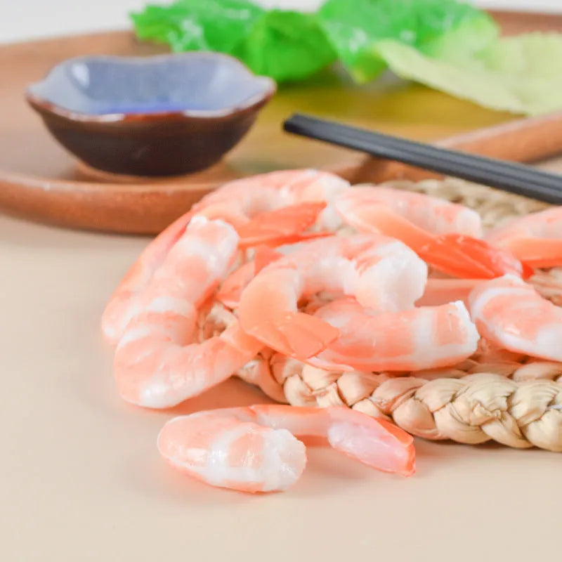 PVC injection moulded shrimp-shaped keychain with door buckle attachment measuring 1.5cm thick