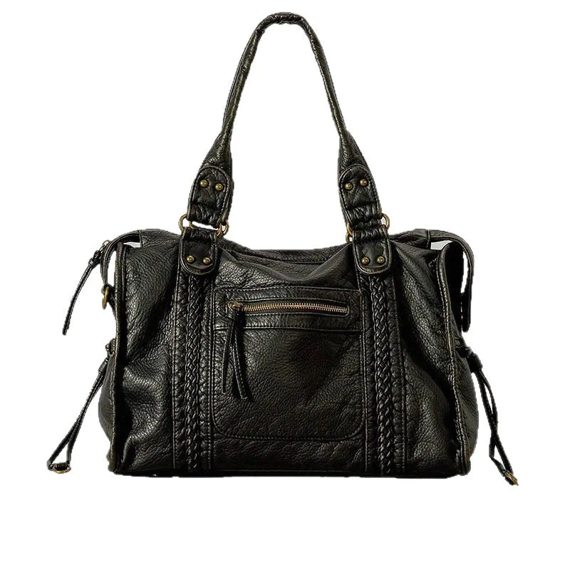 Women's retro motorcycle shoulder messenger bag in brown with weaving design elements and single adjustable strap