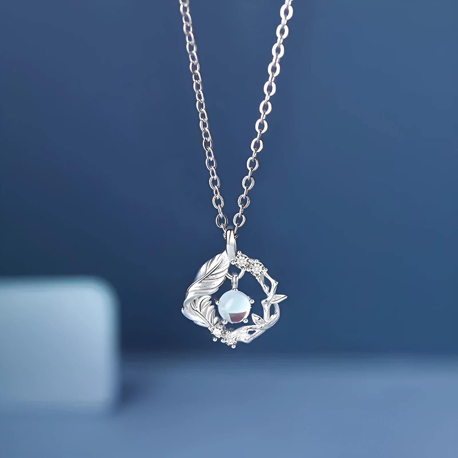 Tree and bird pendant necklace with adjustable chain and alloy construction