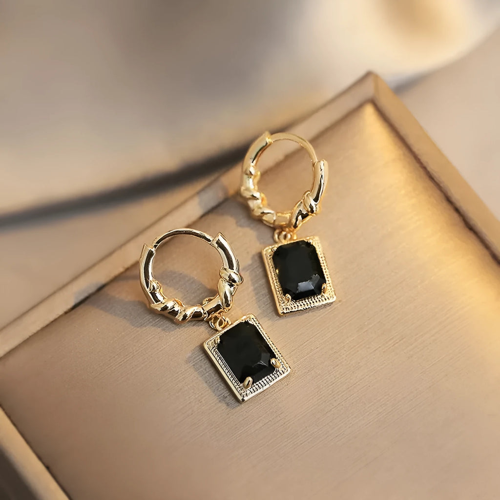 Geometric black zirconia and copper earrings with a quadrilateral shape, E2506 Black colour.