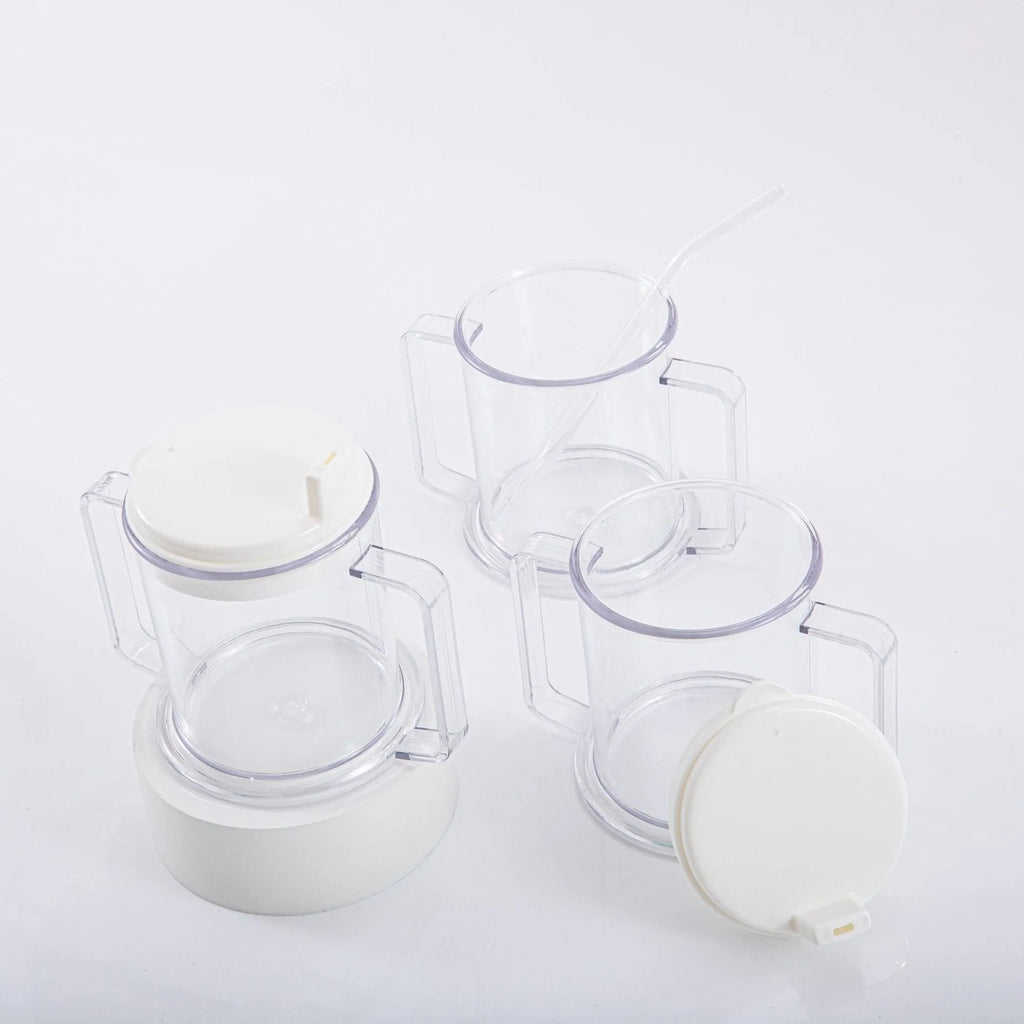 Transparent spill-proof lightweight plastic drinking cup on a table.
