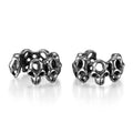 Stainless steel skull earrings with hollow geometric design and clip-on style