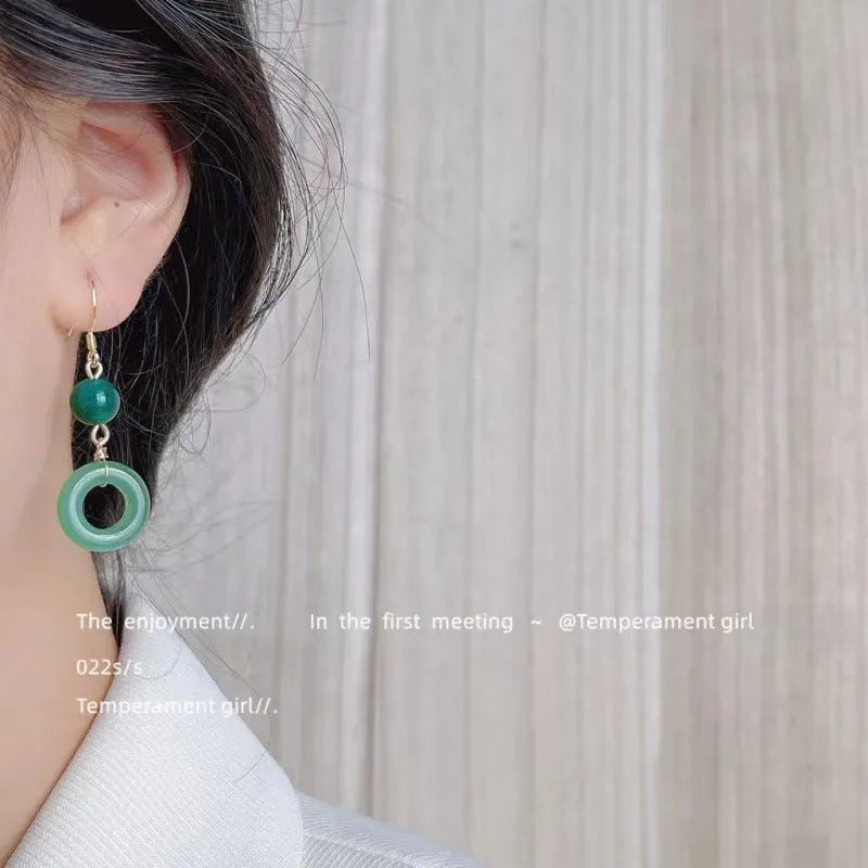 Chinese style green peace buckle shape earrings with geometric design and gold plating