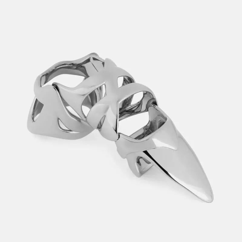 Silver coloured punk armour finger stall ring on a hand.