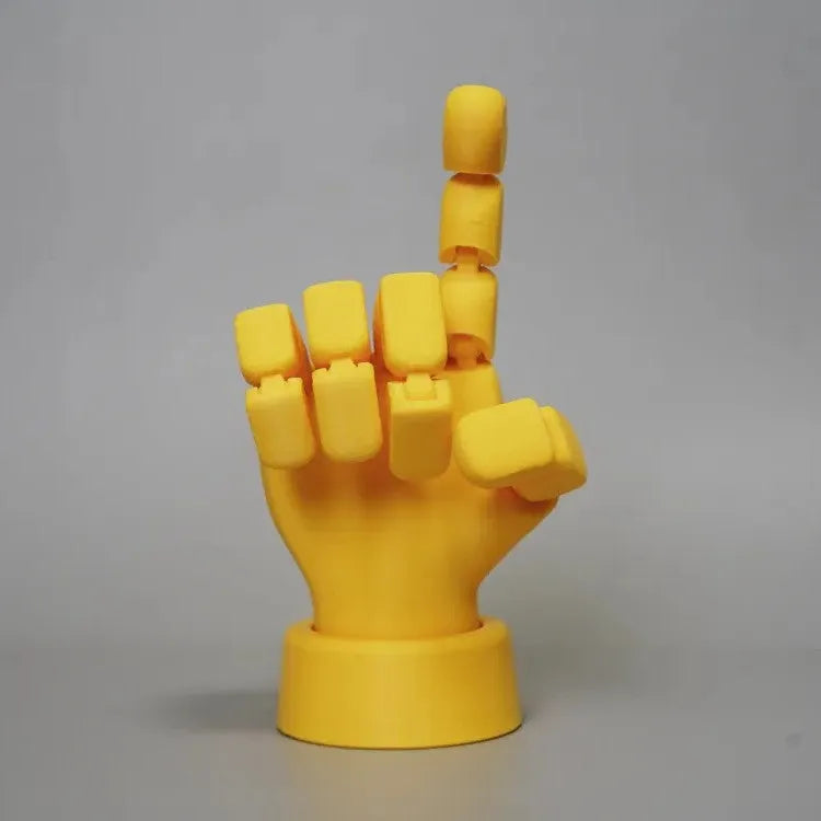 Yellow PLA movable joint hand ornament in a decorative pose.