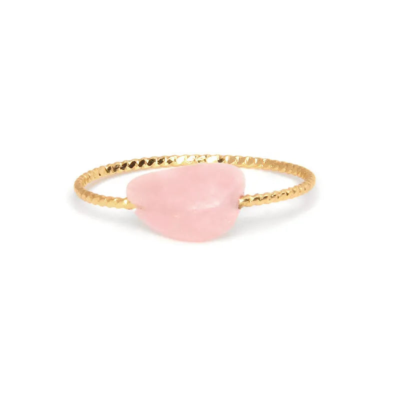 Women's geometric niche design ring with a coloured agate stone centrepiece.