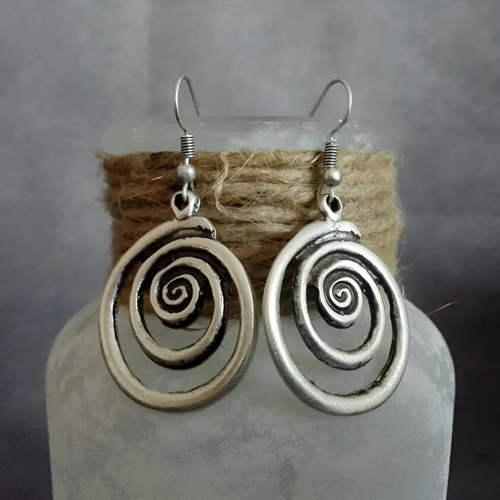 Retro geometric spiral earrings with distressed silver finish measuring 2.6cm by 5cm