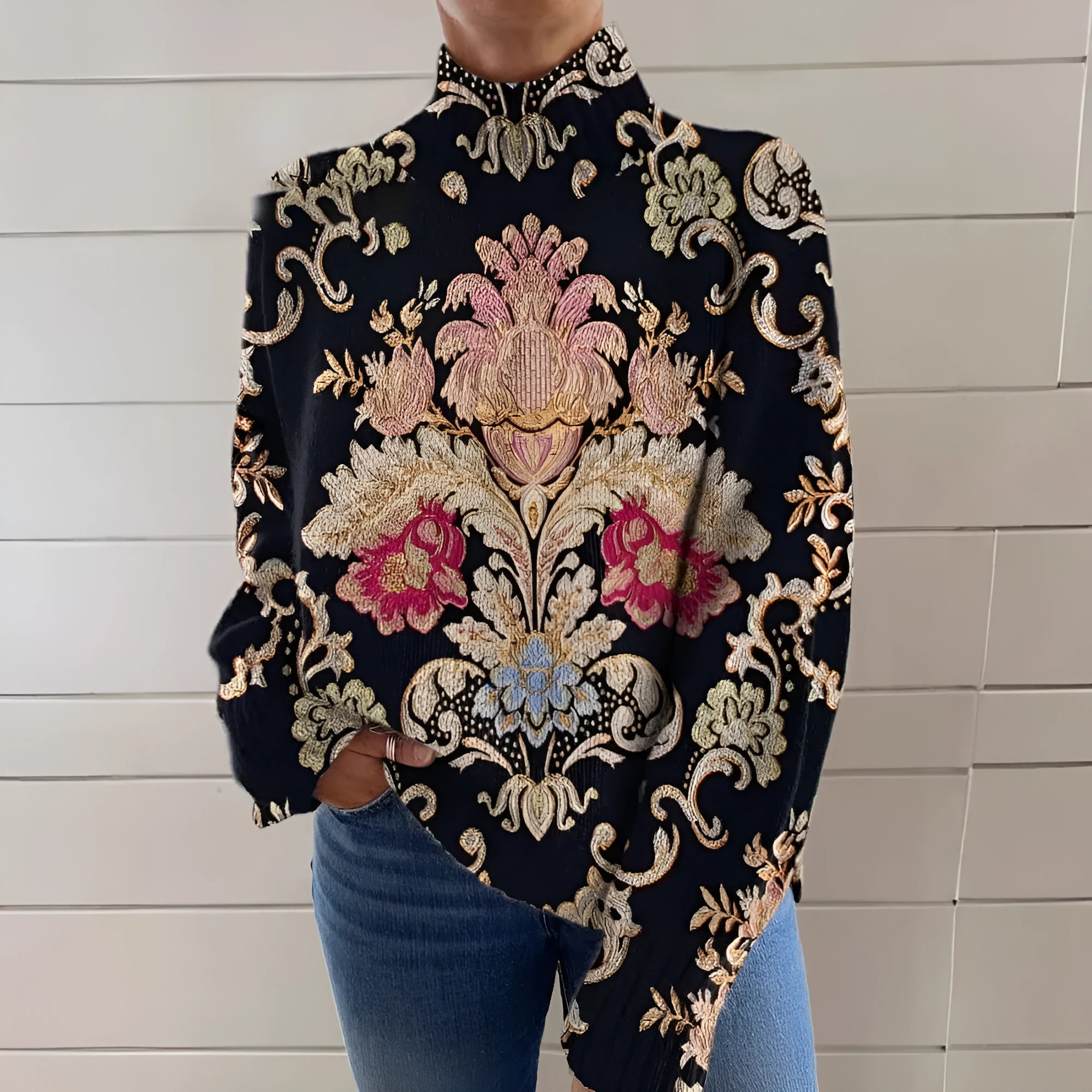 Black 3D pattern turtleneck long sleeve loose-fit pullover sweater on a hanger.