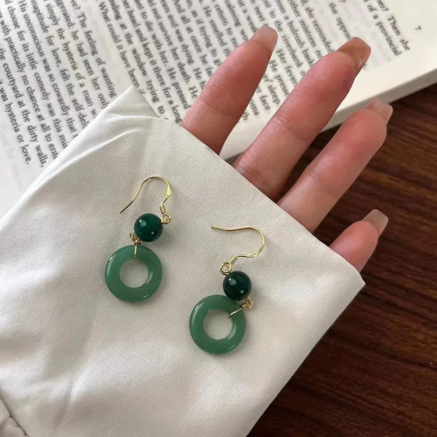 Chinese style green peace buckle shape earrings with geometric design and gold plating