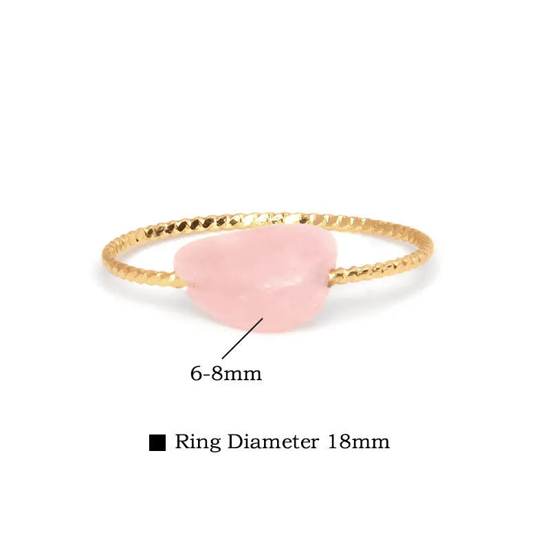 Women's geometric niche design ring with a coloured agate stone centrepiece.