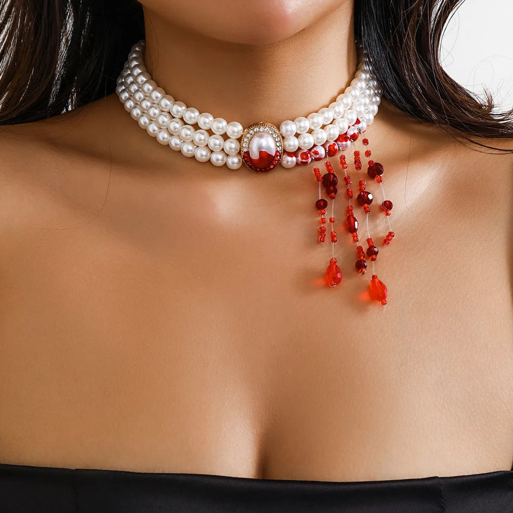 Gothic pearl collar jewellery set with gold electroplated finishes showing necklace, bracelet, and earrings