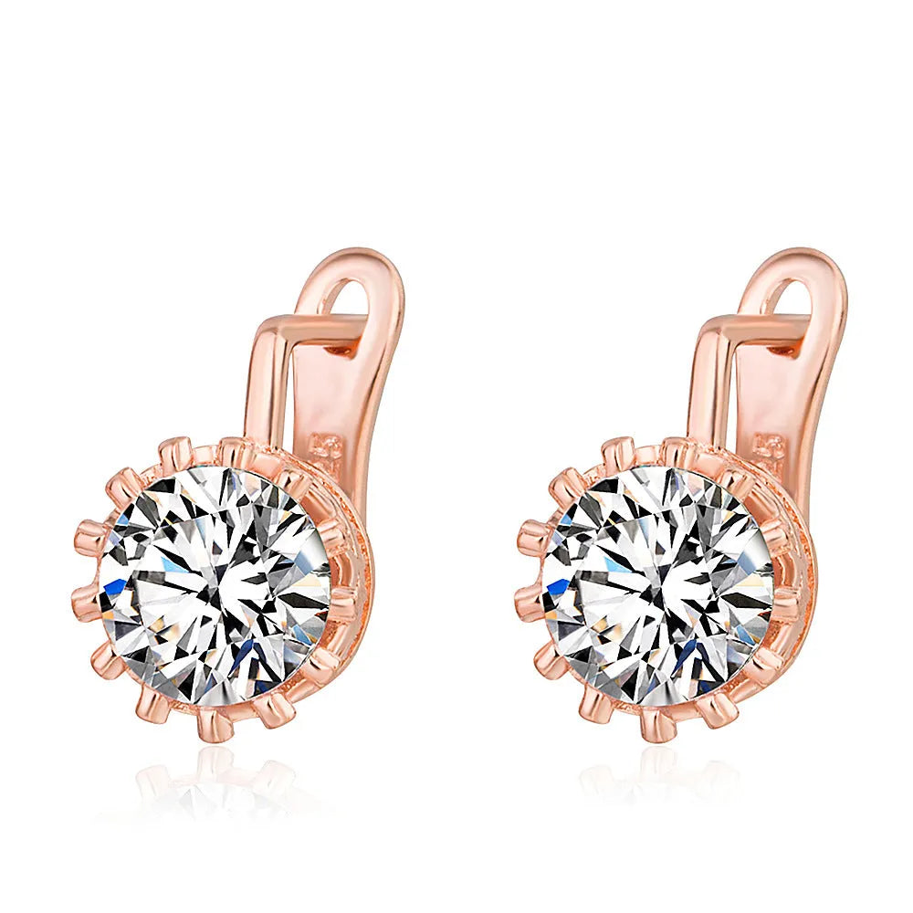 Korean retro style crown-shaped ear clips with rhinestones in rose gold and white gold colour options.