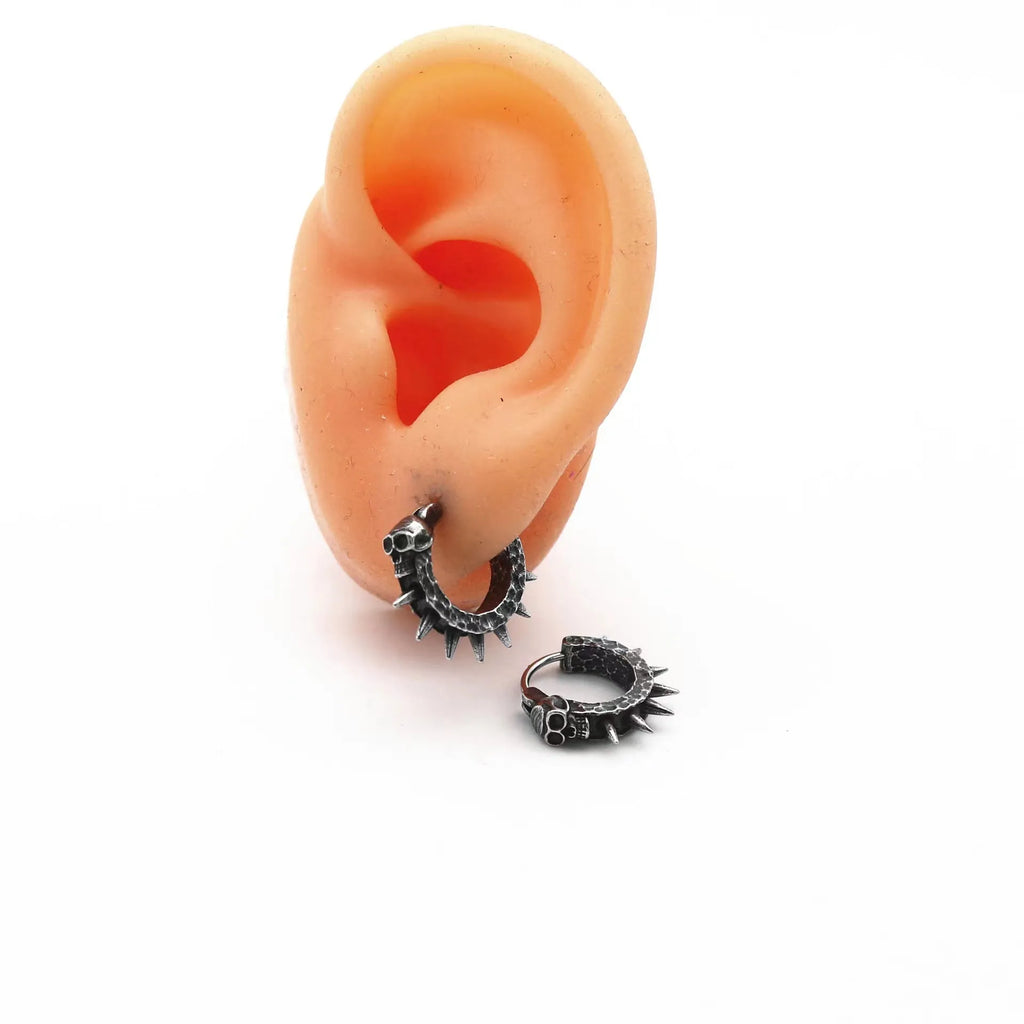 Copper and black geometric motorcycle earrings with alloy and plastic construction