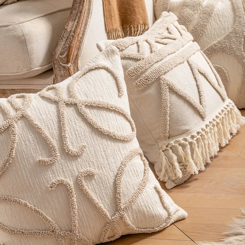 Knitted pillow cover with tassel fringe in striped pattern