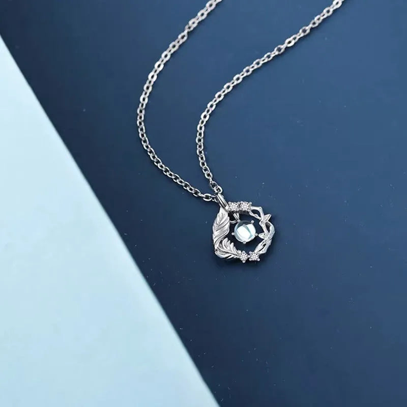 Tree and bird pendant necklace with adjustable chain and alloy construction