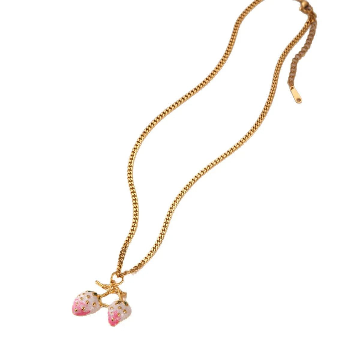 A women's necklace with a detailed strawberry-shaped alloy pendant on a stainless steel chain, shown in red and white gradient colour options.