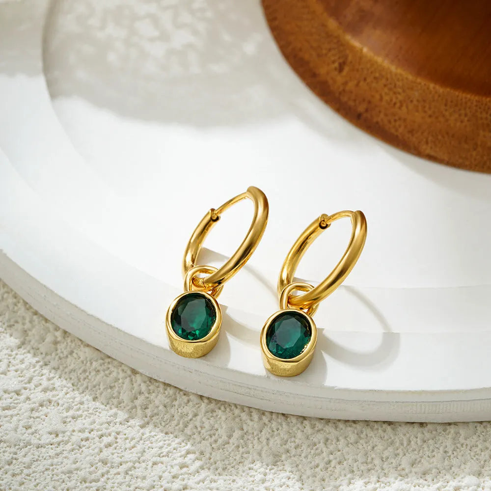 Close-up of women's copper oval zircon drop earrings in army green, showing post and clutch back.